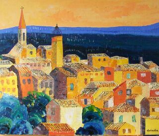 Village provençal de La Cadière-d'Azur aux toits ocre sous un ciel orange