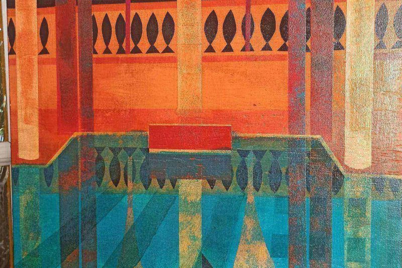 Décor architectural tunisien géométrique aux couleurs orange et turquoise